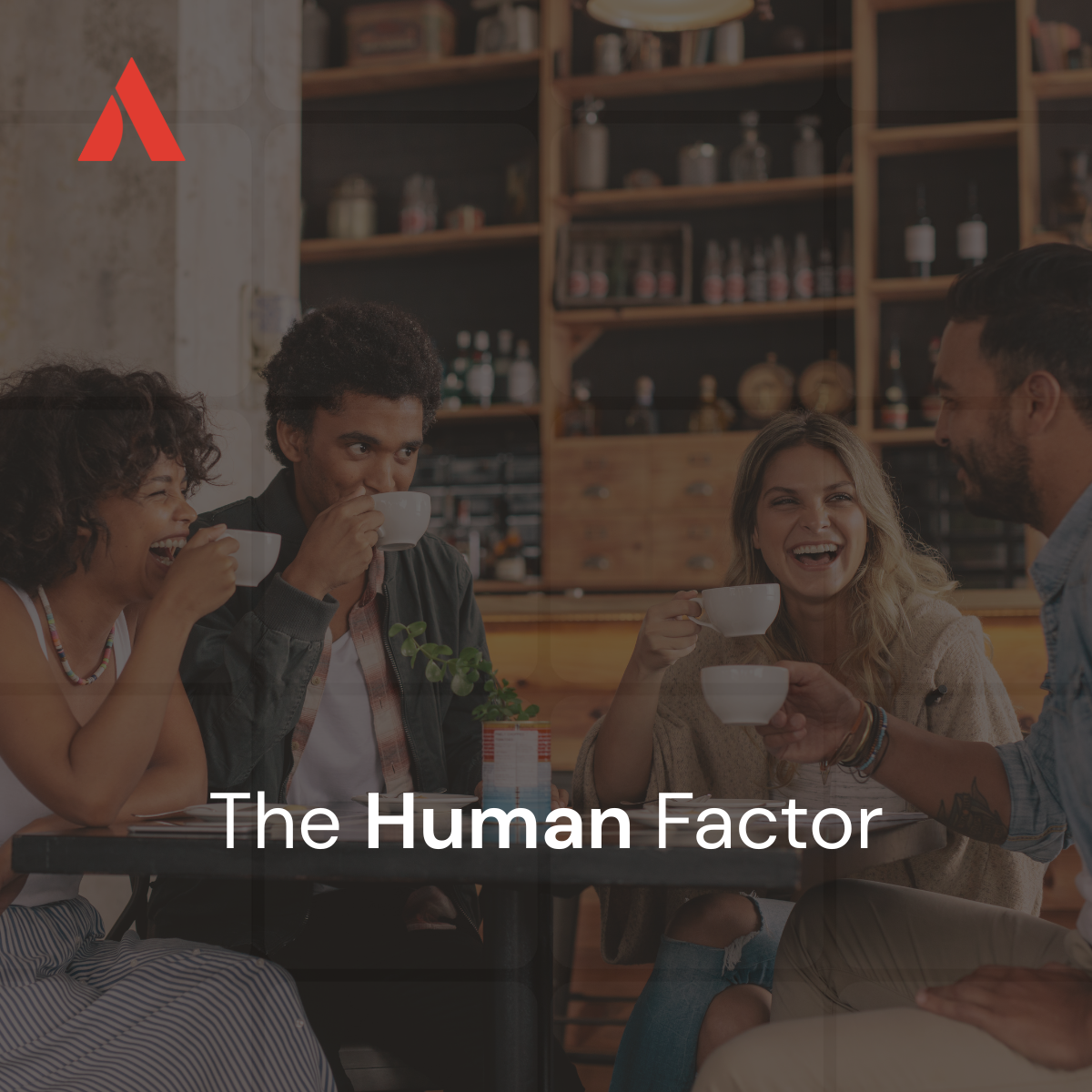 Four people laughing and chatting over coffee, representing human connection and trust.